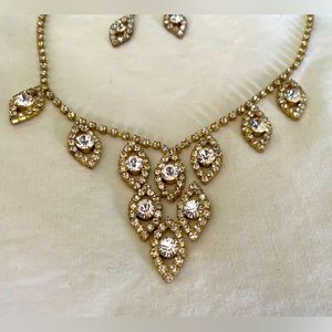 Rhinestone necklace and earrings.